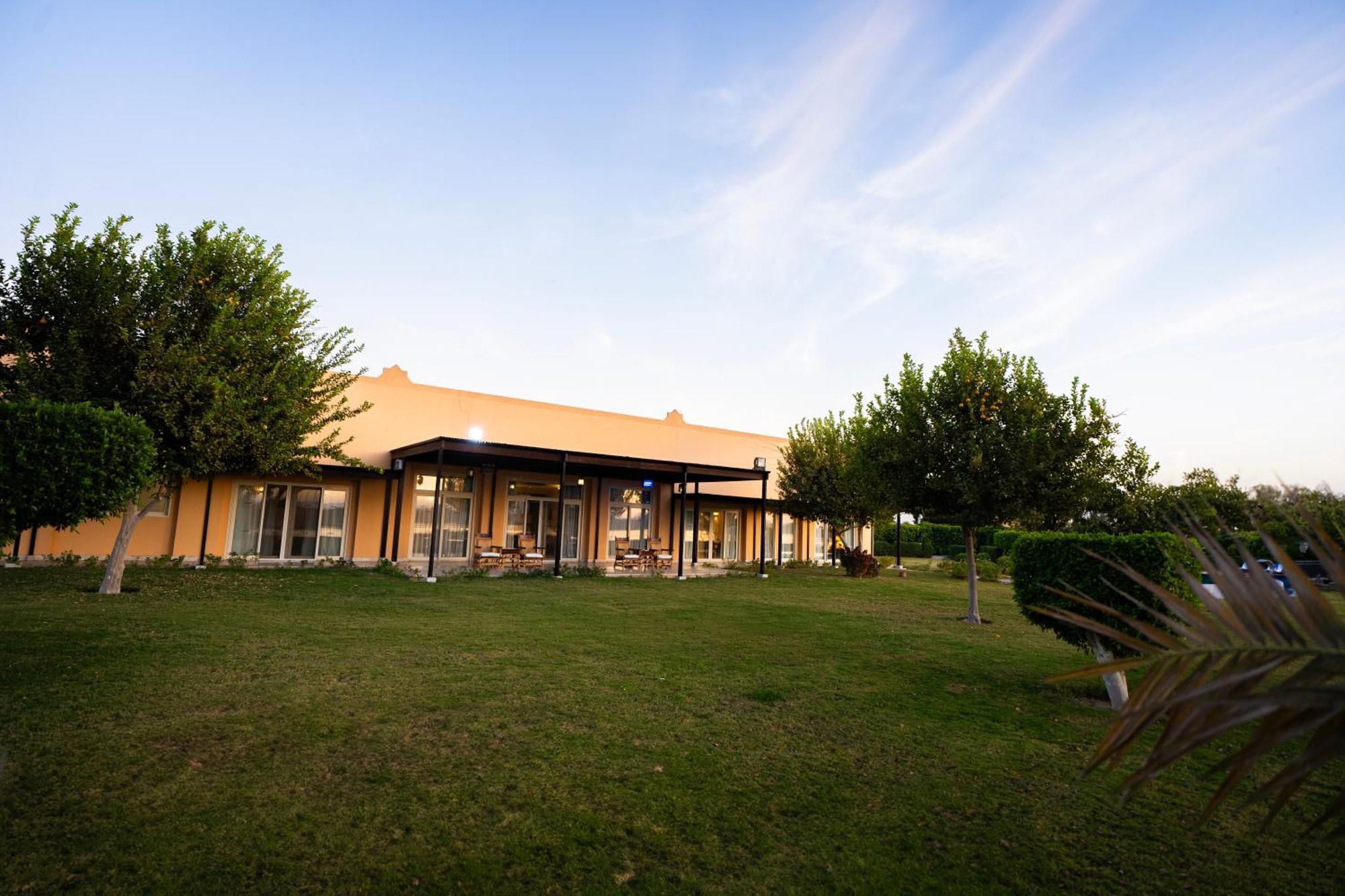 Jolie Ville Hotel & Spa Kings Island Luxor Exterior photo The clubhouse at the club's headquarters in the village of Kfar Saba