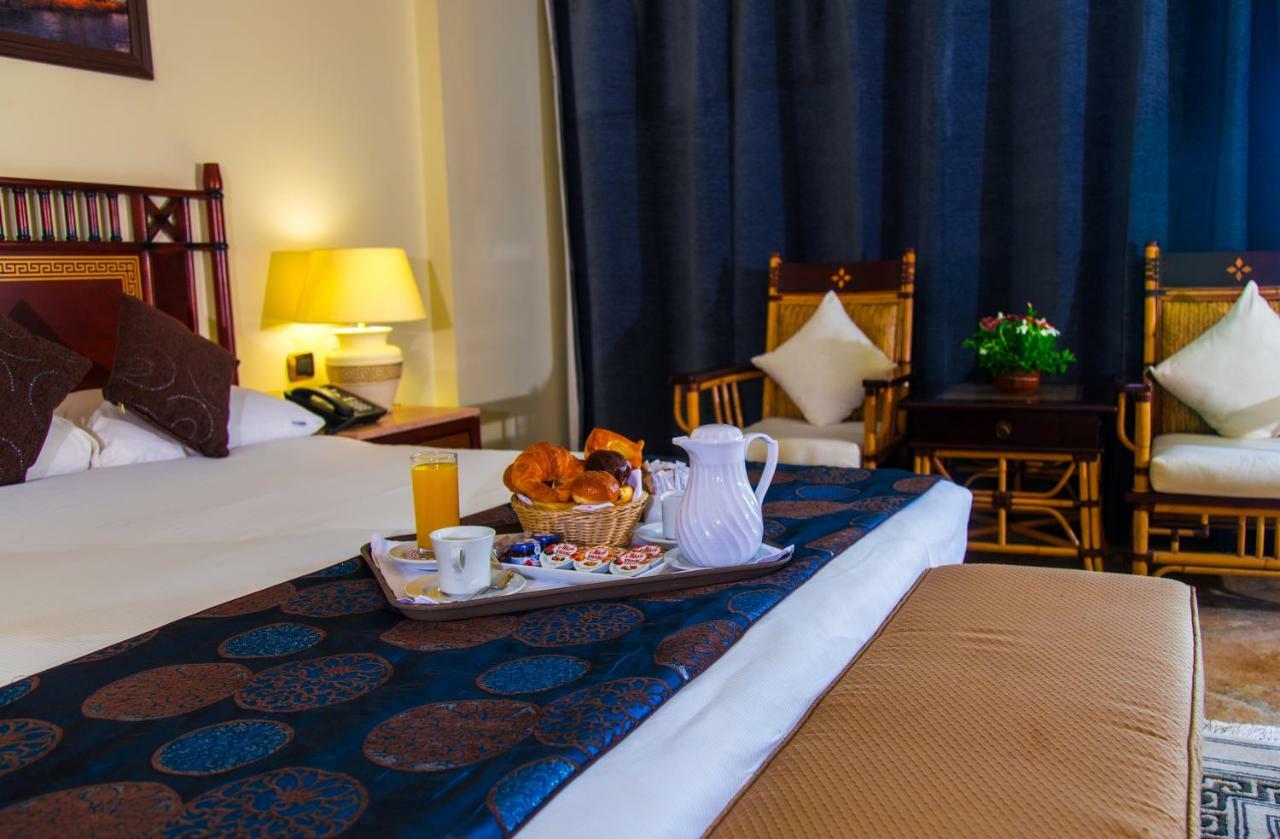 Jolie Ville Hotel & Spa Kings Island Luxor Exterior photo A room at the Nile Hilton